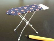 Ironing board fixed in 'up' position - M182