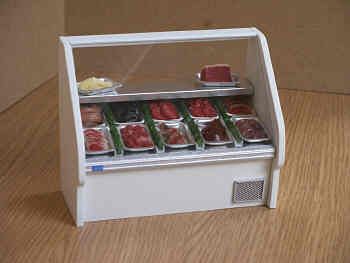 Chiller Cabinet filled with a selection of Meat on trays - CH1M