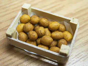 Potatoes in wood box - F174B