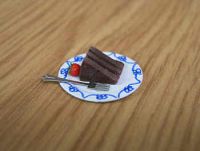Chocolate Fudge Cake slice on plate - F256