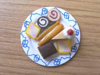 Cakes assortment on plate - F33